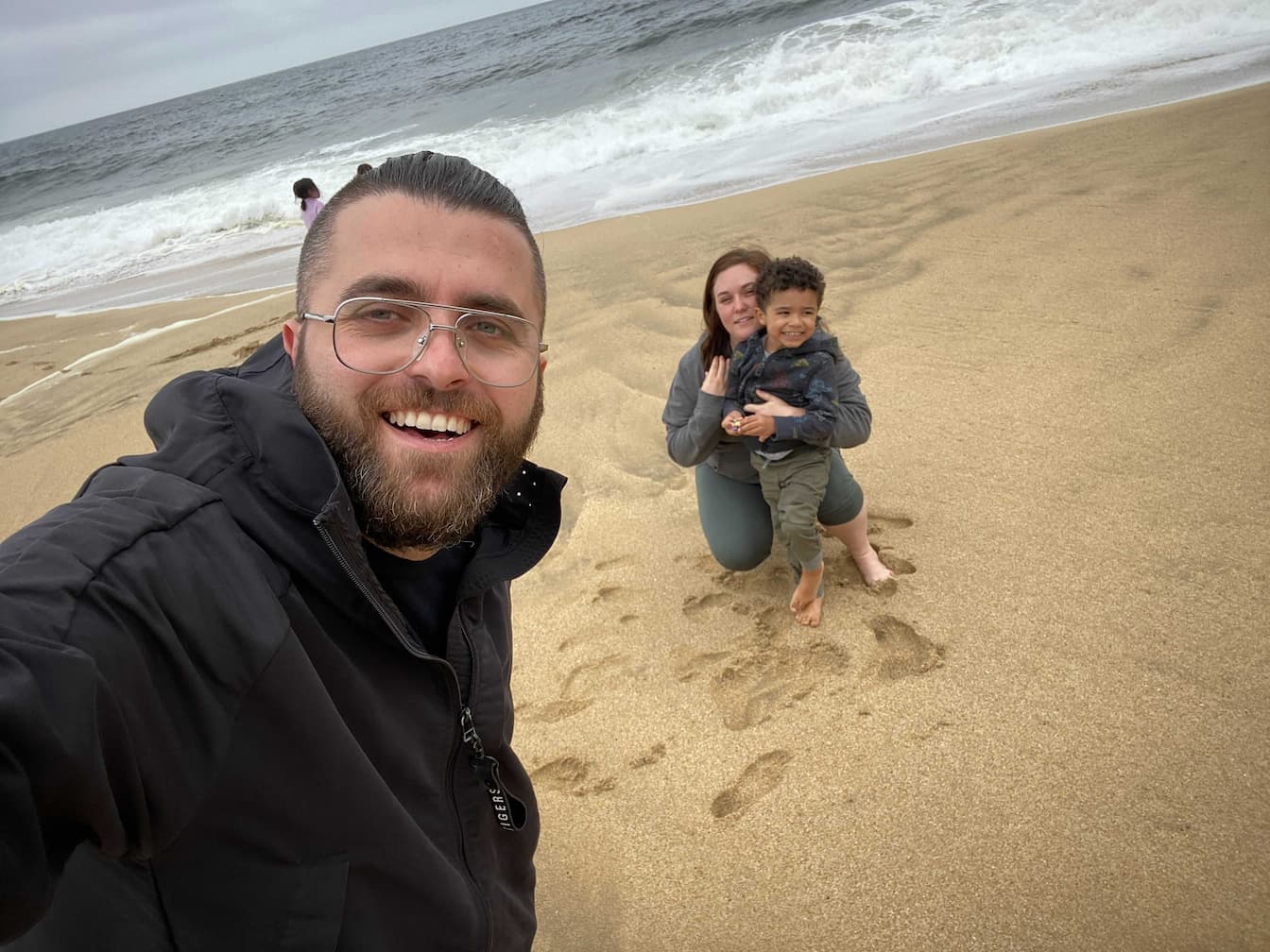 Cem and family enjoying the beach